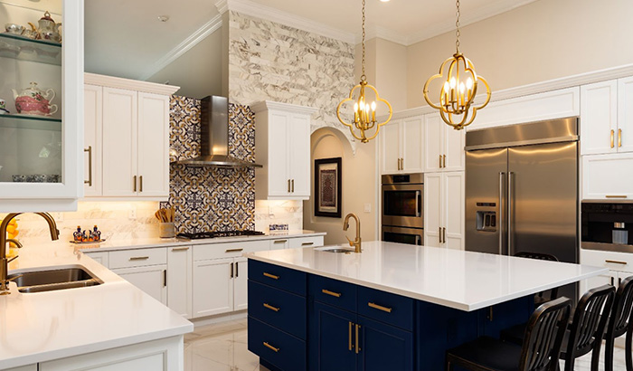 A Kitchen With White Cabinets And Blue Countertops, Perfect For Spring Cleaning And Organizing Kitchen Countertops